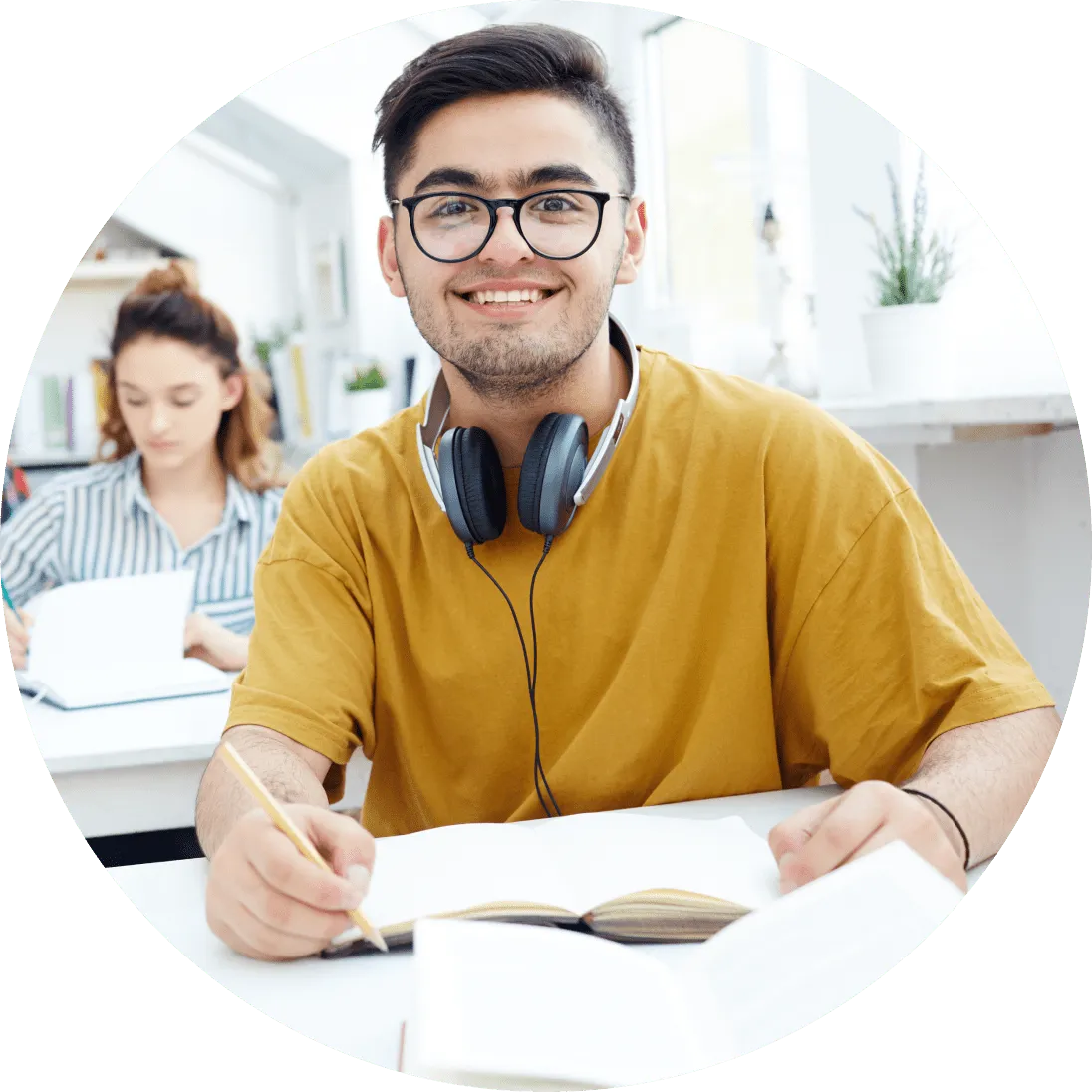 a man wearing glasses and headphones